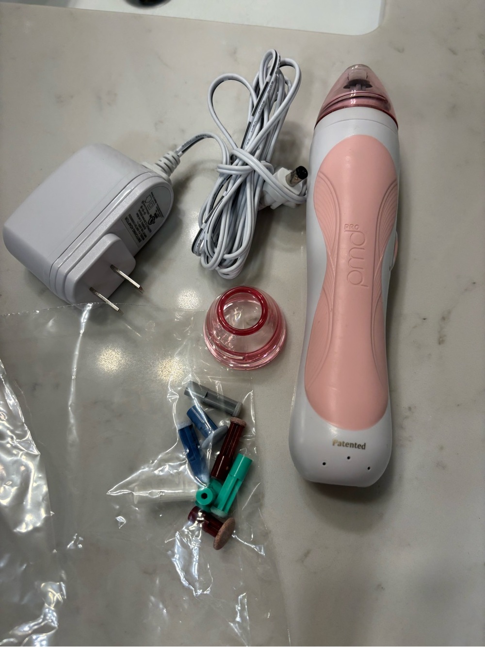 PMD Pink and White Rechargeable Facial Exfoliator